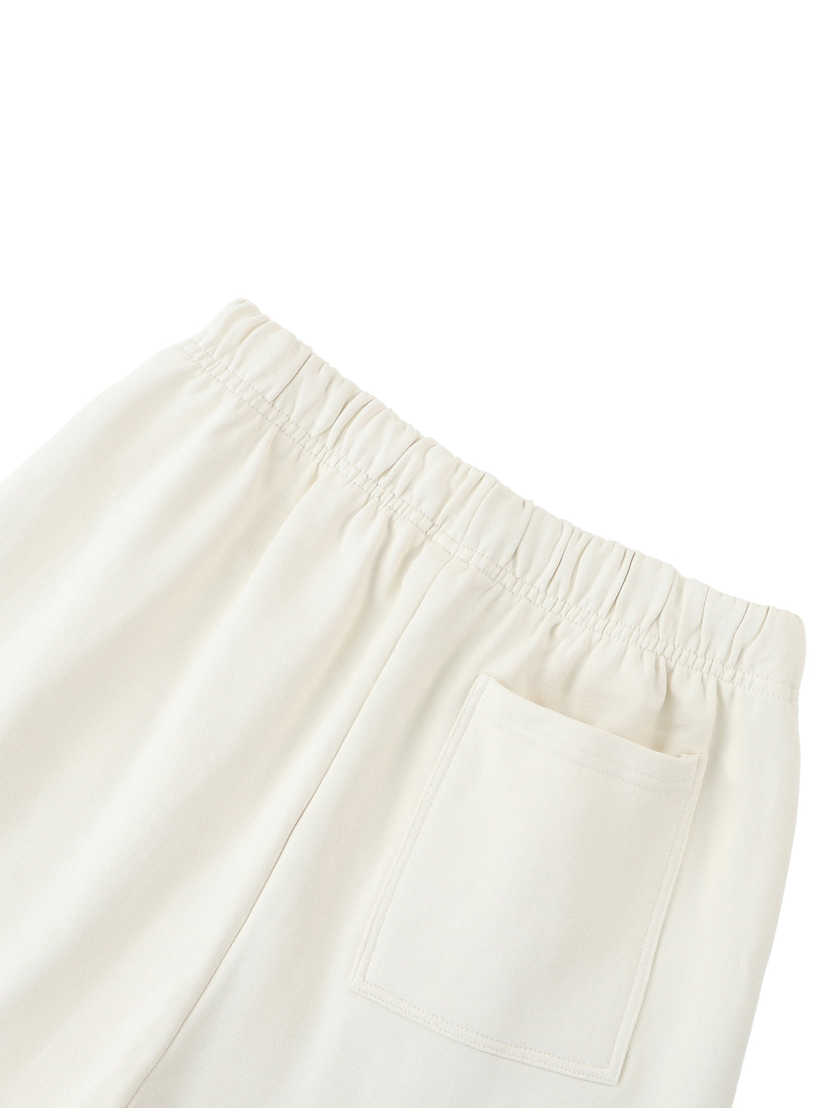 Elastic Signal Sweatpants detail in Apricot: elastic waist and rear patch pocket